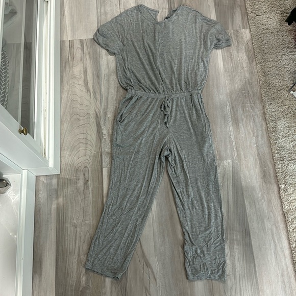 Pants - Gray short sleeve jumpsuit with button back closure, tie waist, pockets